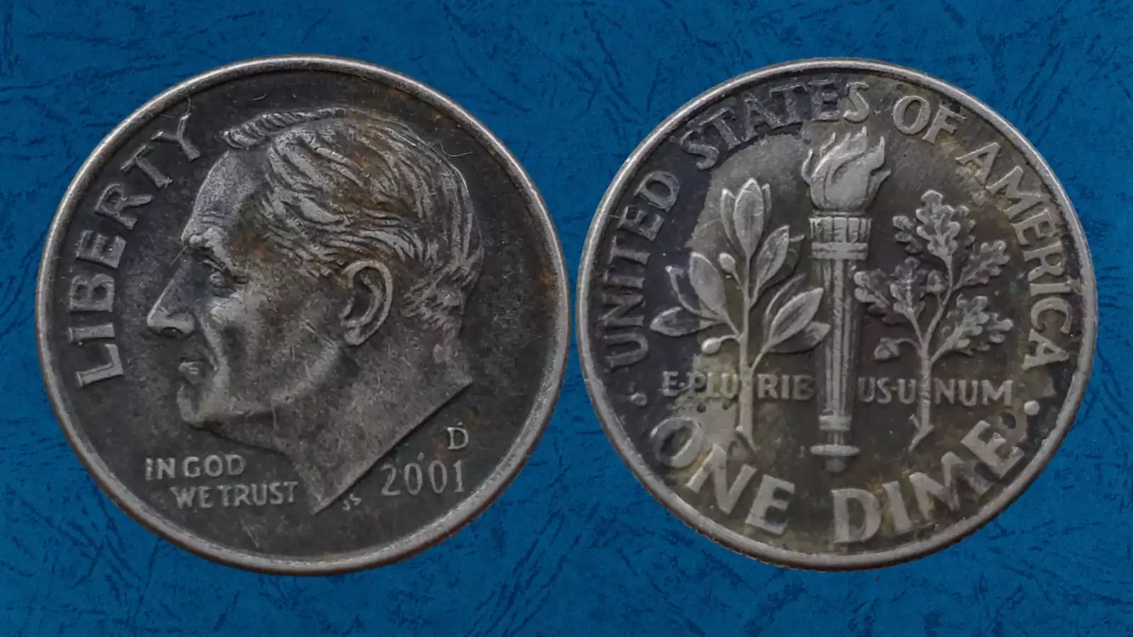 2001 dime missing clad layer error showing copper core exposed on obverse face